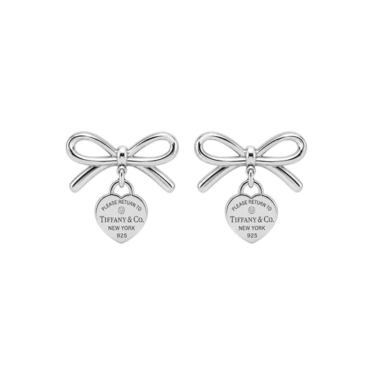 The Silver Dangle Bow “Talia” Earrings