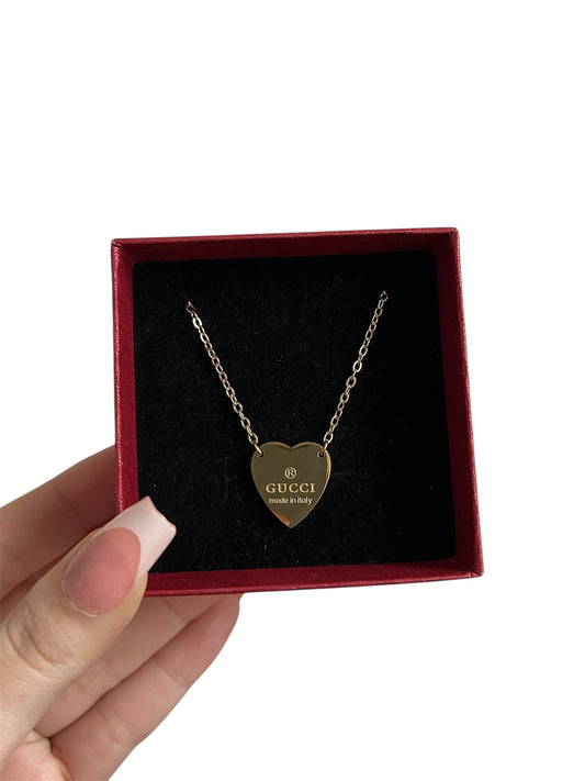 Gold G heart necklace